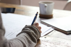 Person working at a desk creating content