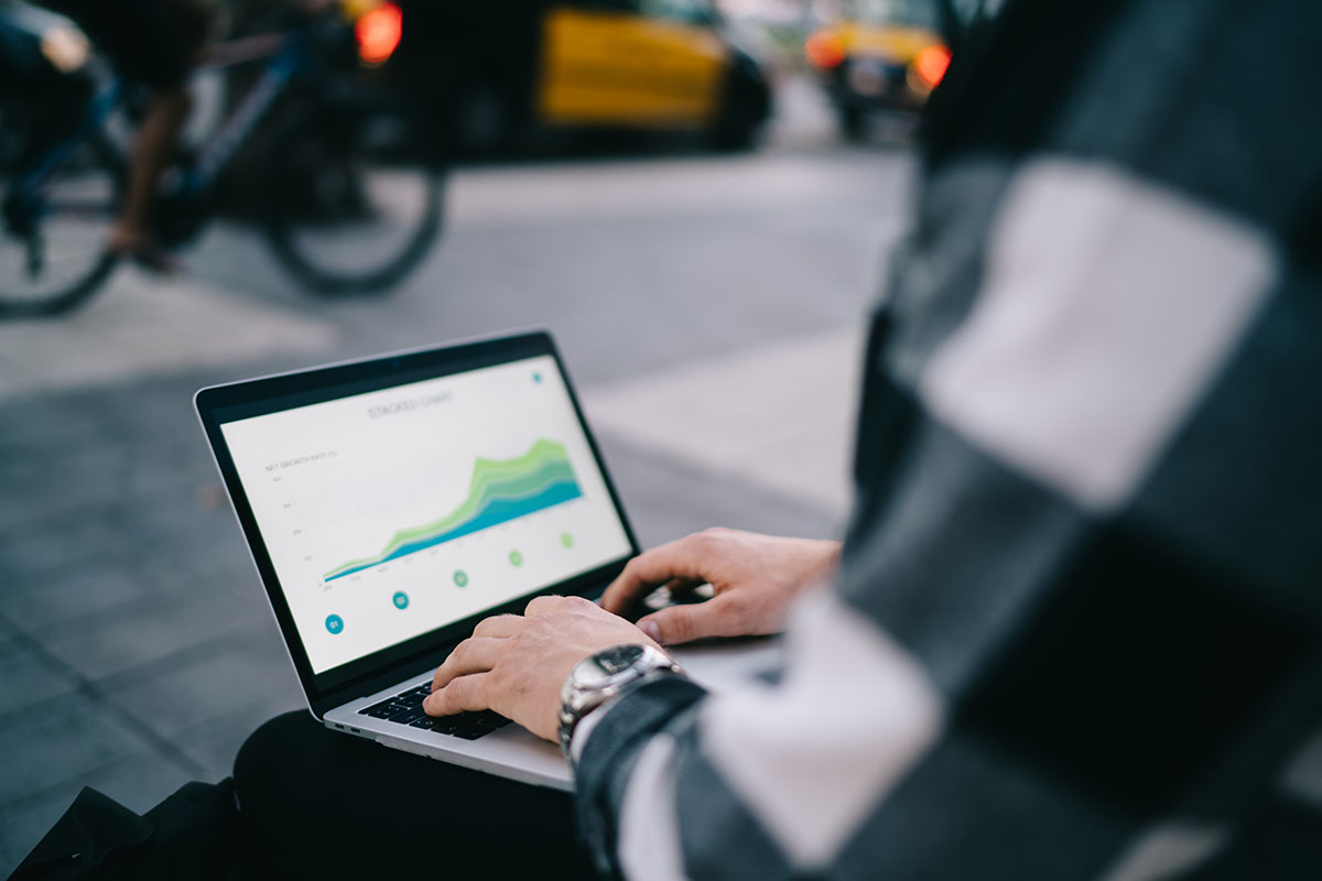 Digital marketer working on laptop