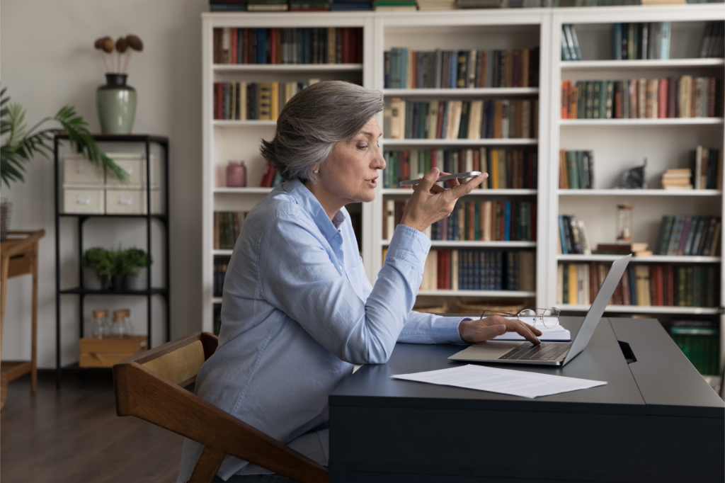 woman using voice search on her phone