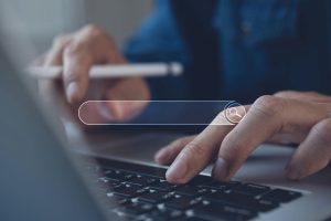 Person searching on laptop