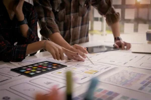 2 people working on web design