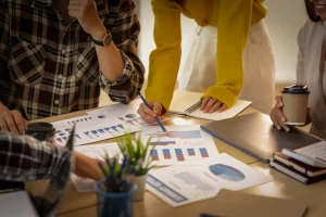 Business partners reviewing marketing data