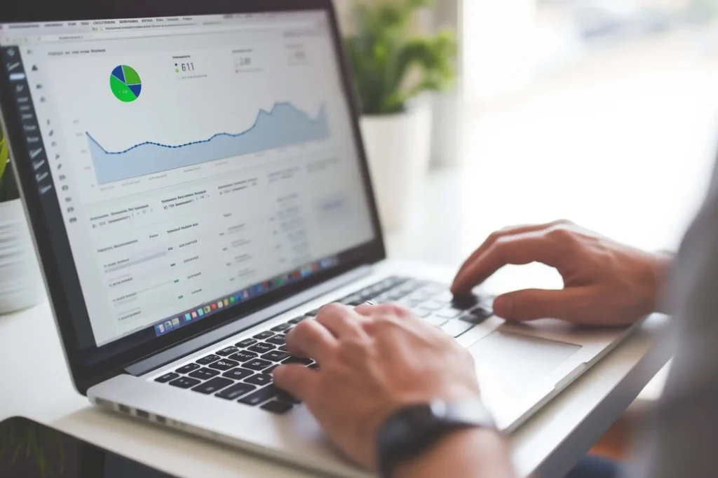 Person working on laptop looking at web analytics